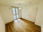 Moderne Wohnung mit Balkon und offener Küche - Erstbezug! - Schlafzimmer