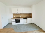 Moderne Wohnung mit Balkon und offener Küche - Erstbezug! - Einbauküche